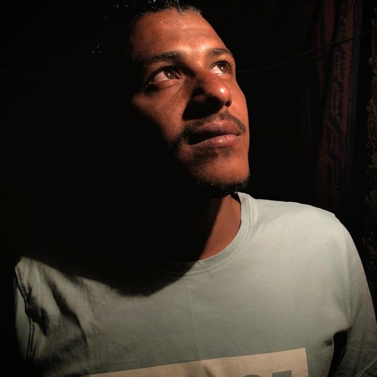 Anya Patel, Lead Design Curator at Urban Forest Fresh, reviewing corporate floral arrangements